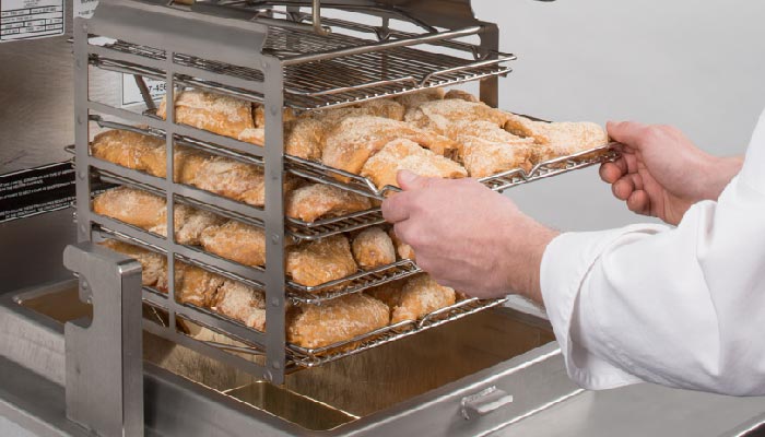 DSL Northwest - Kitchens with great demand for delicious fried chicken  trust Henny Penny Pressure Fryers! Henny Penny's exceptional pressure fryer  can effortlessly accommodate a substantial 24-pound (11-kilogram) chicken  load and comes